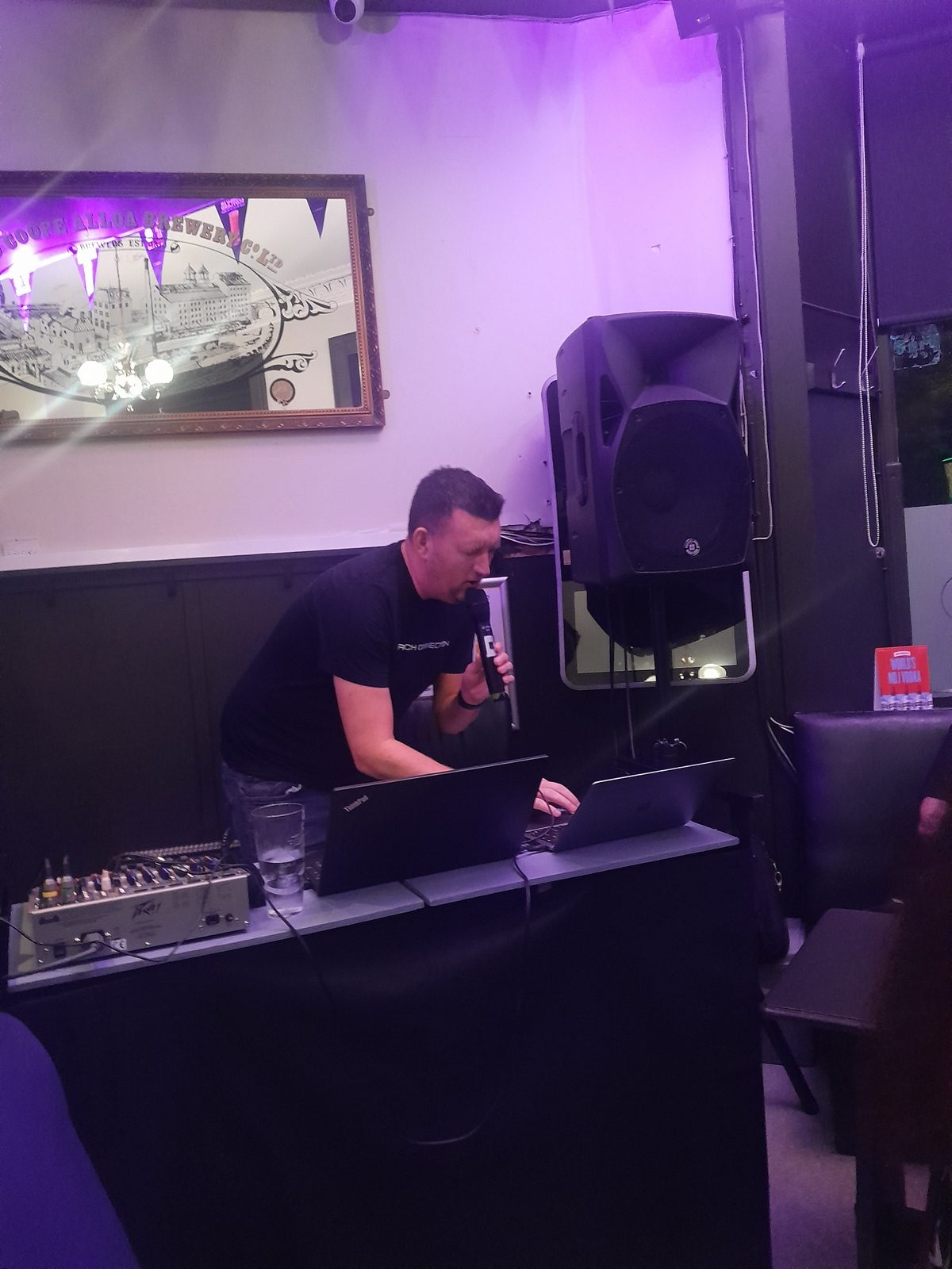 A DJ at the decks in the Station Bar, Alloa